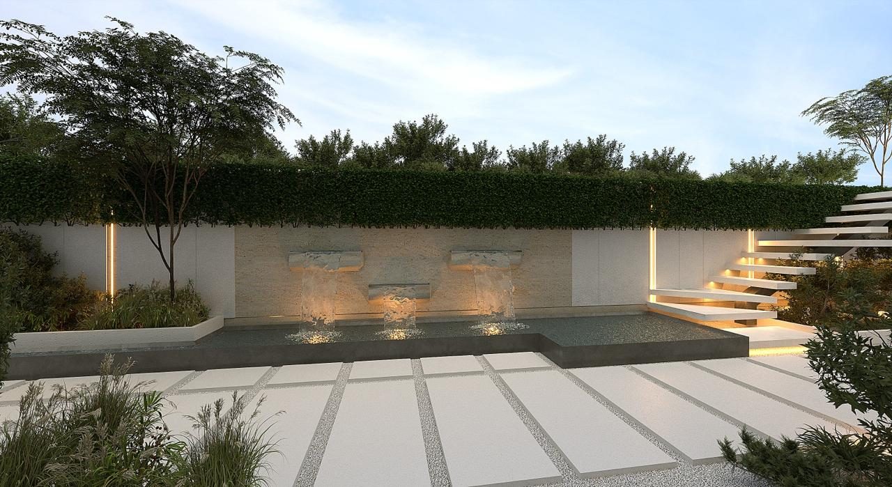 Garden water feature with lit spouts and floating steps