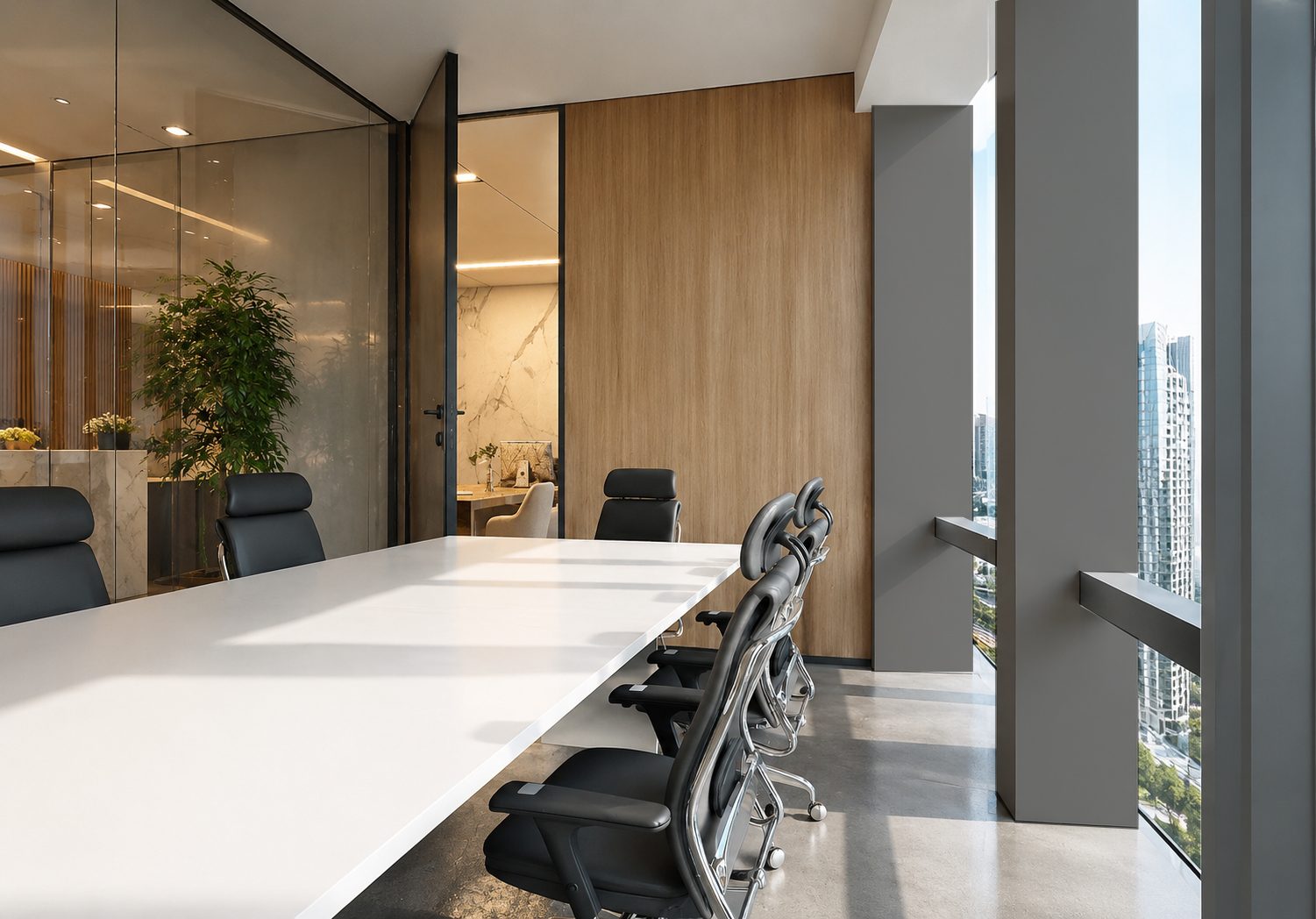 Meeting room with a white table and black mesh chairs