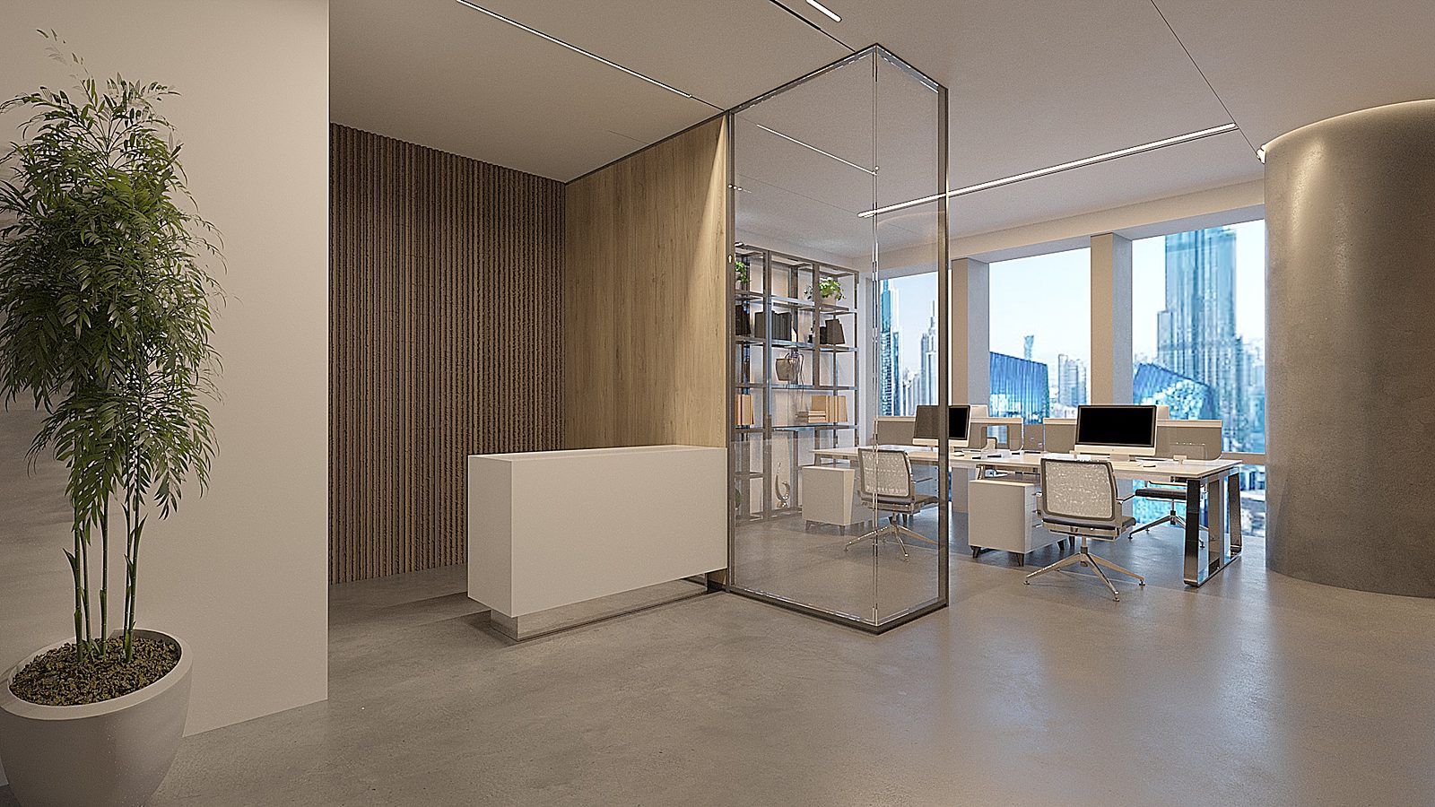 Reception desk beside a glass-walled office