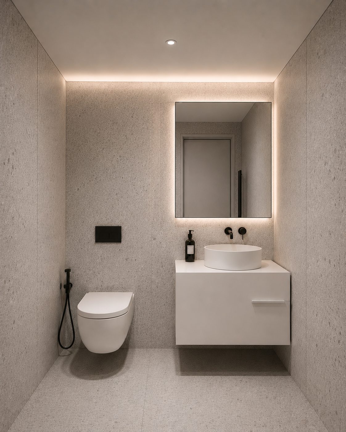 Washroom in terrazzo with a backlit mirror