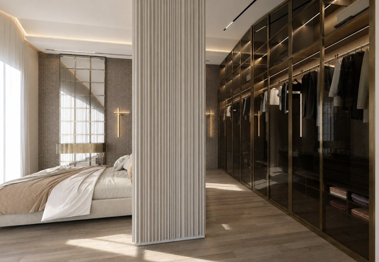 Bedroom opening onto a glass-fronted walk-in wardrobe