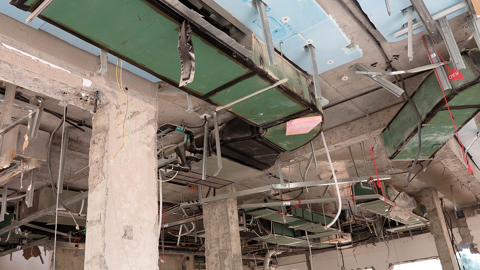 Ceilings removed, exposing the old services