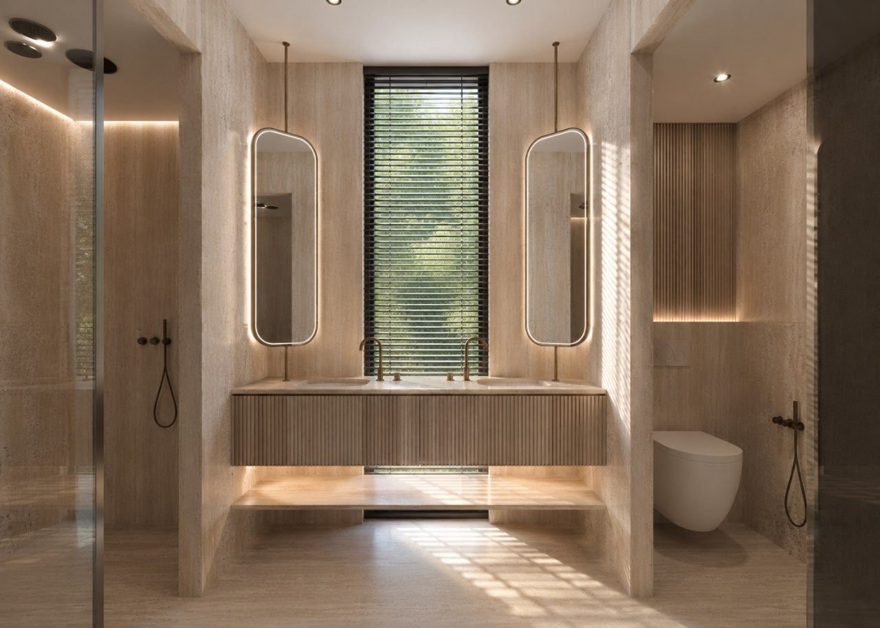 Master bathroom in travertine with twin mirrors and a walk-in shower