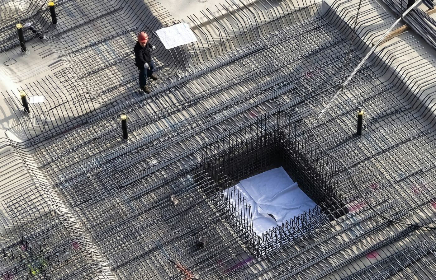 Aerial view of raft reinforcement around a lift pit, ready for inspection